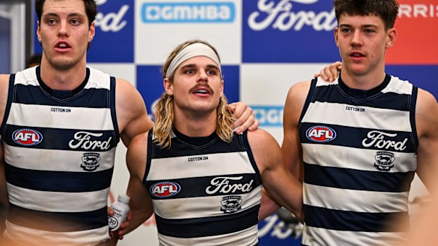 Cats star Bailey Smith is pictured singing the team song after a Geelong victory.