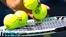 MASON, OHIO - AUGUST 18: Iga Swiatek of Poland selects tennis balls for the match against Marketa Vondrousova of the Czech Republic during the quarter-final on Day 6 of the Western & Southern Open at Lindner Family Tennis Center on August 18, 2023 in Mason, Ohio. (Photo by Robert Prange/Getty Images)