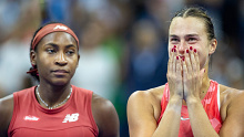Coco Gauff and Aryna Sabalenka react during the trophy presentation after Gauff's win in the 2023 US Open women's singles final.