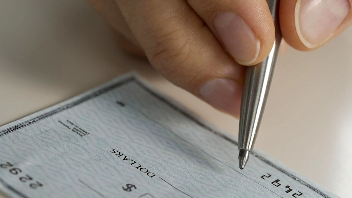Finance news: Cheques in Australia to be phased out by 2030 | Nine.com.au