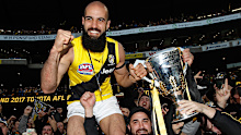 Richmond defender Bachar Houli celebrating the 2017 AFL grand final triumph.