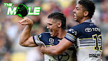Tom Chester of the Cowboys celebrates after scoring a try.