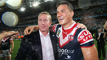 Sonny Bill Williams celebrates the Roosters' 2013 grand final win with coach Trent Robinson.