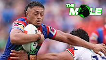 Knights young gun Jermaine McEwen busts through a tackle.