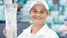 Ashleigh Barty poses with the winner's trophy after defeating Bianca Andreescu in the Miami Open final.