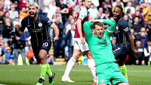 Manchester City's Sergio Aguero, left, celebrates after scoring his side's opening goal 