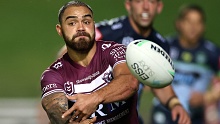 Dylan Walker of the Sea Eagles passes against the Canberra Raiders.