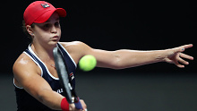 Ashleigh Barty plays a forehand in her WTA Finals loss to Kiki Bertens.