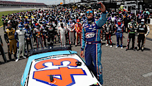 NASCAR's Bubba Wallace takes a selfie with fellow drivers amid extraordinary scenes at Talledega.