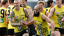 Dustin Martin and Bachar Houli of the Tigers share a joke during a Richmond Tigers AFL training