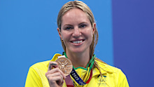 Emily Seebohm poses with the bronze medal she won in the 200m backstroke at the Tokyo Olympics in 2021.
