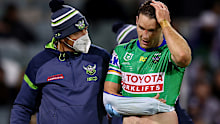 Jarrod Croker of the Raiders is taken from the field with an injury 