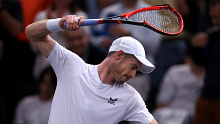 Three-time British grand slam champion Andy Murray smashes his racquet after losing to Australia's Alex de Minaur at the Paris Masters.