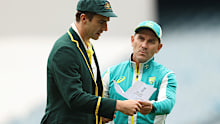 Pat Cummins, Justin Langer.
