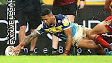 Jamayne Isaako scores the winning try in the 89th minute as the Titans downed the Dragons.