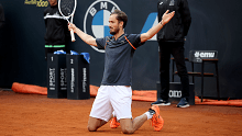 Daniil Medvedev celebrates winning match point in the men's single's final of the Italian Open over Holger Rune.