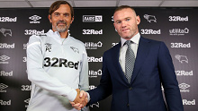 Wayne Rooney with Derby manager Phillip Cocu after signing as a player/coach.