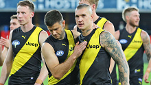 Jack Riewoldt of the Tigers leads his team out during round 11 