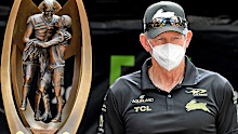 Wayne Bennett beside the NRL premiership trophy in Brisbane
