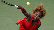 Serena Williams serves to Sloane Stephens during their third round US Open match.