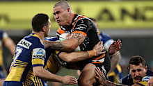 Russell Packer takes a hit-up for Wests Tigers.
