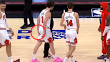 Josh Giddey holds his injured hamstring.