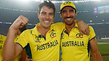 Pat Cummins and Mitchell Starc of Australia celebrates after the ICC Men's Cricket World Cup India 2023 Final between India and Australia at Narendra Modi Stadium on November 19, 2023 in Ahmedabad, India. (Photo by Darrian Traynor-ICC/ICC via Getty Images)