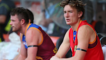 BRISBANE, AUSTRALIA - SEPTEMBER 05: Lions substitute Harris Andrew sits on the bench during the round 23 AFL match between the Brisbane Lions and the Western Bulldogs at The Gabba on September 5, 2015 in Brisbane, Australia. (Photo by Chris Hyde/Getty Images)