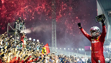 Race winner Sebastian Vettel of Germany and Ferrari celebrates in parc ferme during the F1 Grand Prix of Singapore last year.