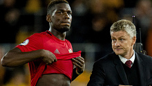 Paul Pogba and Manchester United manager Ole Gunnar Solksjaer after drawing with Wolves.