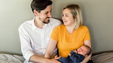 A northern Sydney couple has been left with a A$120,000 debt to a Canadian hospital after their son was born via surrogate six weeks early.