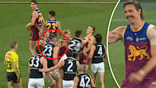 Joe Daniher celebrates his goal after Jacob Weitering's mistake. 