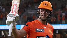Scorchers star Mitchell Marsh leaves the field after making 93 not out against the Heat.