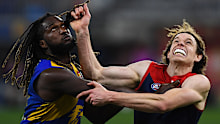 West Coast ruckman Nic Natanui and Melbourne spearhead Ben Brown contest in the ruck.
