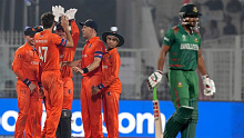 Netherlands' Paul van Meekeren, second left, celebrates with teammates the dismissal of Bangladesh's Najmul Hossain Shanto, right, during the ICC Men's Cricket World Cup match between Bangladesh and Netherlands in Kolkata, India,