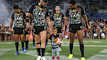 Quaden Bayles walks out with the Indigenous All Stars, smiling from ear to ear. A wonderful moment.