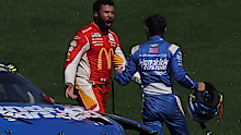 Bubba Wallace confronts Kyle Larson after a crash at Las Vegas.