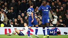 Heung-Min Son of Tottenham Hotspur and Antonio Rudiger of Chelsea clash.