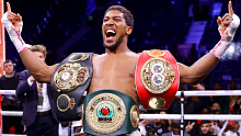 Anthony Joshua with his world title belts after beating Andy Ruiz.