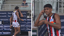 Nasiah Wanganeen-Milera speaks with coach Ross Lyon over the phone about his substitution.
