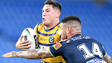 Mitchell Moses and Nathan Peats collide in the closed stadium round two Eels vs Titans NRL clash.