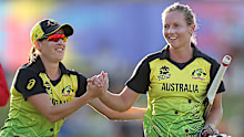 Meg Lanning of Australia celebrates with Megan Schutt 