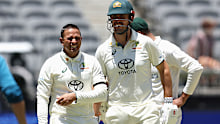 Usman Khawaja was one of several batters to cop a ball to the body during the Perth Test on a controversial pitch