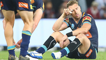 Bryce Cartwright (R) of the Gold Coast Titans during a loss to the Warriors.