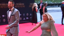 Brisbane Lions great Jason Akermanis' partner lost her footing due to a bump in the Brownlow Medal red carpet at Crown