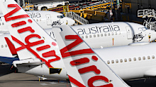 Grounded Virgin Australia planes are seen at Tullamarine Airport in Melbourne