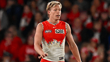 Isaac Heeney of the Swans watches on during the round 17 AFL match between St Kilda Saints and Sydney Swans.