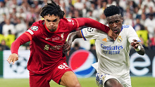 Liverpool's Trent Alexander-Arnold battles Real Madrid's Vinicius Jr in the 2022 UEFA Champions League final