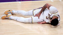 Anthony Davis lays injured during Game Four.