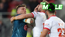 Warrington Wolves' Josh McGuire is tackled by St Helens Saints' Matty Lees, during the Betfred Super League match at the Totally Wicked Stadium, St Helens on Thursday April 20, 2023. 